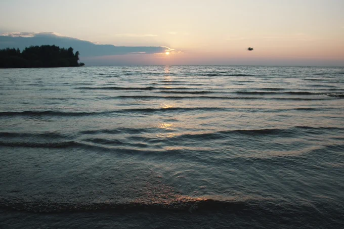 Sunset over a large lake.
