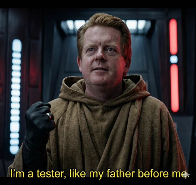 Bas is in a brown hooded cloak and black glove raising a fist inside a futuristic room with glowing panels. Text reads, "I'm a tester, like my father before me."