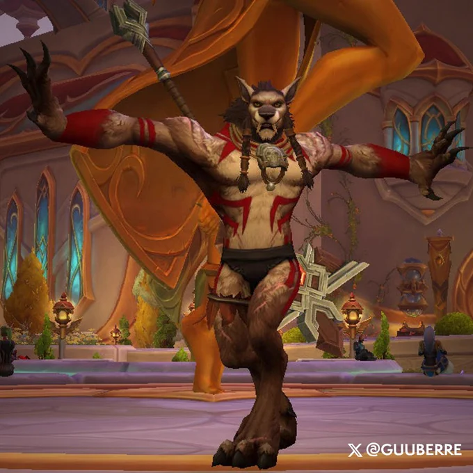 This image is of a tan Worgen male with two braids, one on each side of his face, with red paint on him, wearing a loincloth. He has a staff equipped on his back, and he\u2019s mid twirl, with both arms out. The background is of Silvermoon, where we can see greenery and gold accents all around.