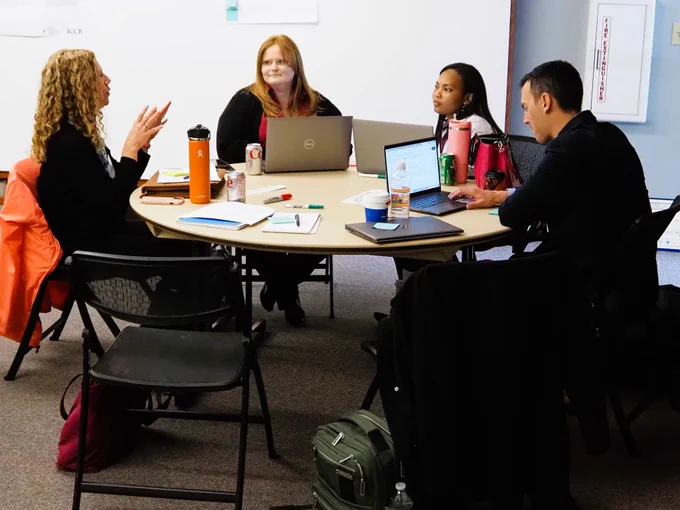 Attendees conversing at a roundtable session of the 2026 SUCCESS Communities of Practice Convening at Lincoln Land Community College in Springfield
