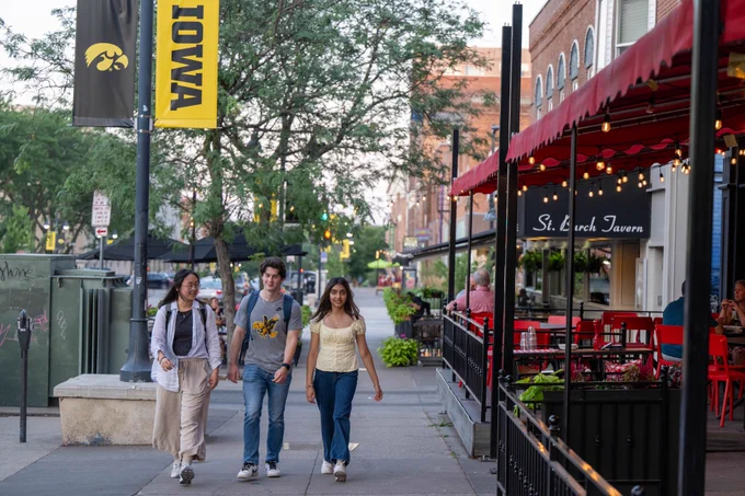 Students walking through downtown.
