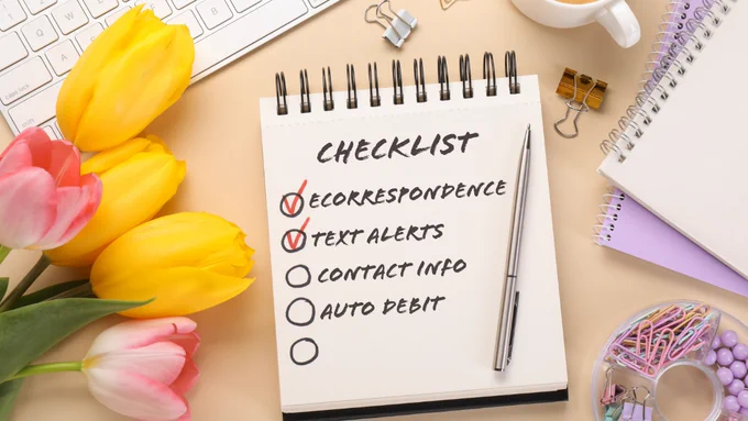 “Spring Loan Checklist” notepad with four checkboxes that mirror the bullets (eCorrespondence, text alerts, contact info, auto debit). Add a subtle “May” or “spring” accent (leaf, sparkle).