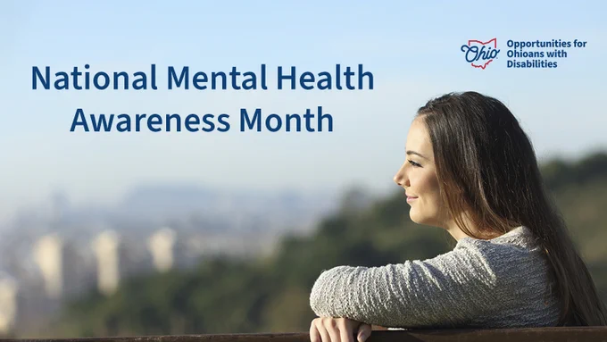 A woman smiles while sitting on a bench at a city overlook. Text, "National Mental Health Awareness Month." OOD logo.