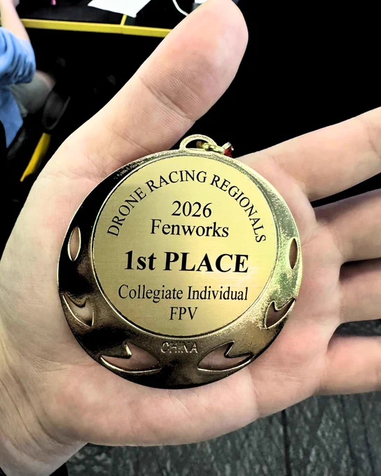 Medal saying drone racing regional 2026 Fenworks 1st place collegiate individual fvp
