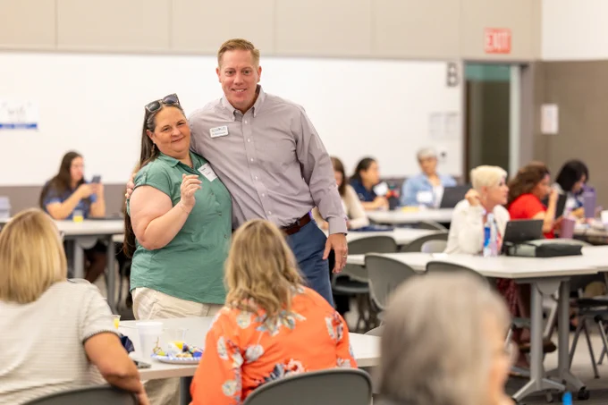 Dr. Brad Schnautz greets session participants at the Admin Advantage Conference.