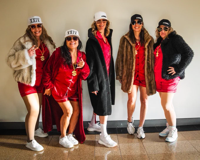 Photo of fans dressed up at Bruno Mars at the Romantic Tour.