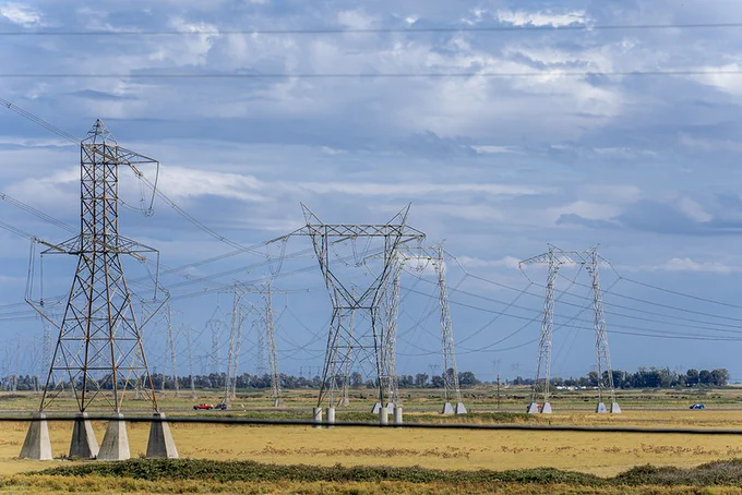 Picture of power lines in a field.