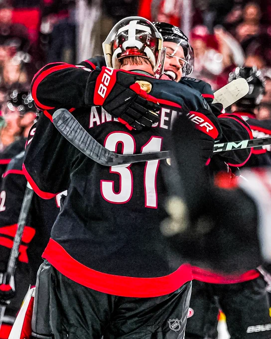 Photo of Frederik Andersen and Taylor Hall hugging after winning Round 2 Game 2 in overtime 