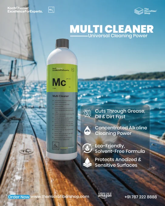 Koch Chemie Multi Cleaner bottle placed on a wooden boat deck near water, showcasing a powerful universal cleaner. Features include strong grease and oil removal, concentrated alkaline formula, eco-friendly solvent-free composition, and safe use on sensitive surfaces.
