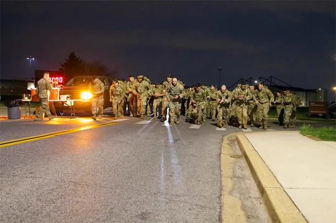 A groups prepares to start the Norwegian Foot March (also known as the Marsjmerket, a ruck marching endurance event) at Joint Base Andrews on April 4, 2026