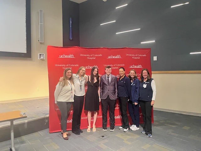 Project SEARCH graduates celebrate their accomplishment at a UCHealth hospital graduation event, recognizing their transition from classroom learning to real‑world job experience.