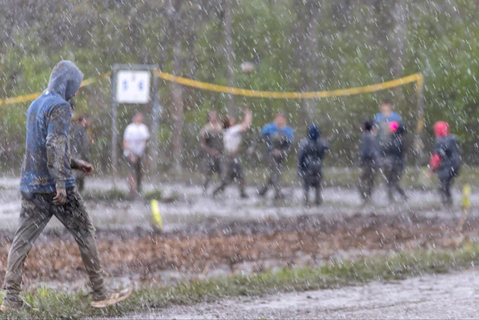 Snow falls during one of the final games at Oozefest 2026.