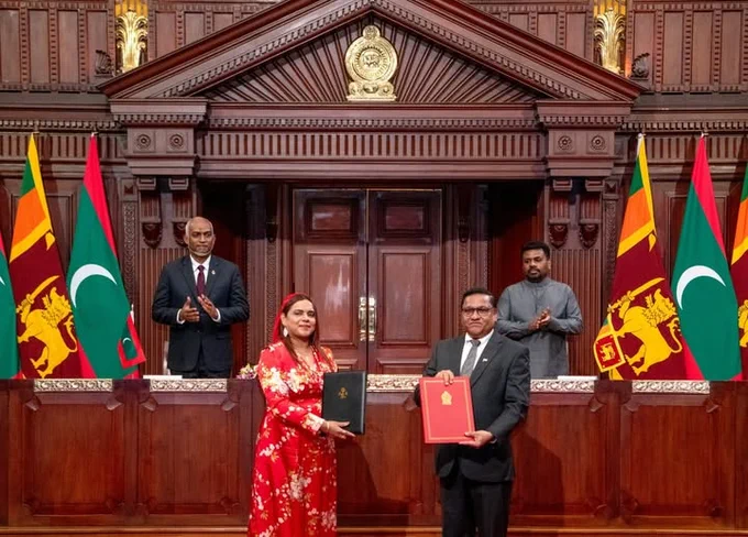 SLNA signs MoU with Maldives Archives
An MoU on Archiving Cooperation between the National Archives of Sri Lanka and the National Archives of Maldives was signed yesterday by Sri Lanka’s Hon. Minister of Foreign Affairs, Foreign Employment and Tourism, Vijitha Herath and the Hon. Minister of Foreign Affairs, Iruthisham Adam of the Maldives.  
In pursuing the desire to promote friendly bilateral relations, not only among leaders but also among the public, the MoU seeks to enhance cooperation in the field of archives and records management and archival preservation, share archival expertise and promote sustainable archival practices between the two countries. 
In the picture, the Hon. President of the Maldives, Mohamed Muizzu and the Hon. President of Sri Lanka, Anura Dissanayake overlook the signing of the MoUs by the foreign ministers of both countries. Image source: President's Office, Sri Lanka 
https://www.presidentsoffice.gov.lk/news/...