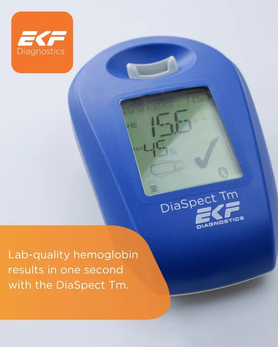 Close-up of a blue DiaSpect Tm device displaying hemoglobin measurement results on its screen.

Text: "Lab-quality hemoglobin results in one second with the DiaSpect Tm".