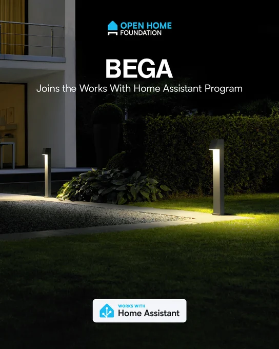 An image taken from the Open Graph of the linked blog. The image is a photograph of a modern garden at night. There is a lawn, segmented by a paved section. The edge of the paved section is lit by waist-high pilars with light shining down from an area on their top.

Overlaid on the top center of the photograph is the text "BEGA Joins the Works with Home Assistant Program". 
Just above this is the "Open Home Foundation" logo. 
At the bottom of the image is the "Works with Home Assistant" logo. 