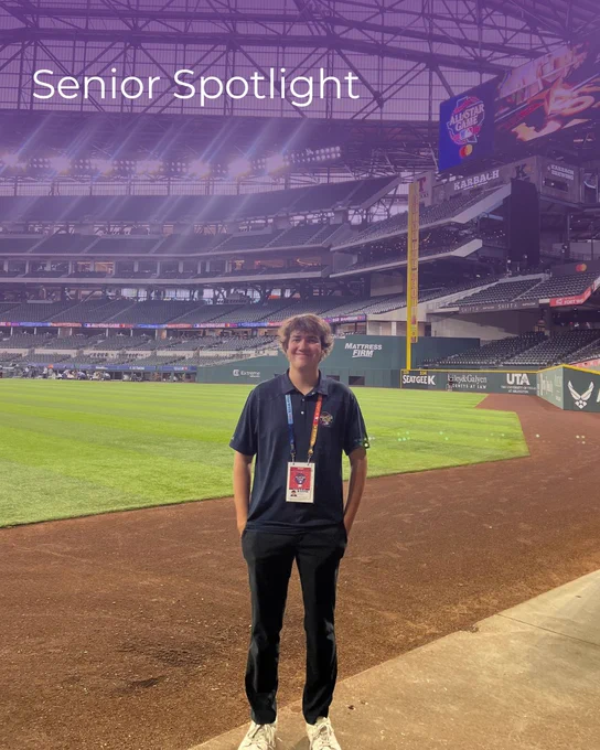 A person stands on the field of a large baseball stadium. The stadium is empty, with a visible roof structure. The words "Senior Spotlight" are written in the top left corner.
