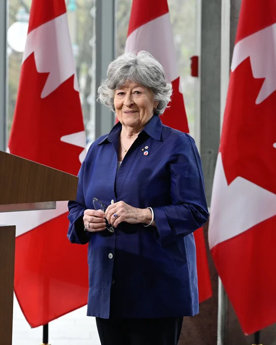 Photo of the Honourable Lise Arbour.

Seen in the background are three Canadian flags.