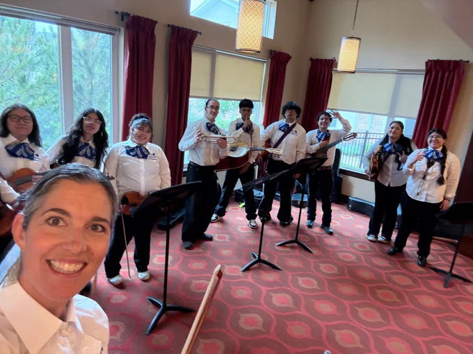 Image of high school mariachi band and their teacher