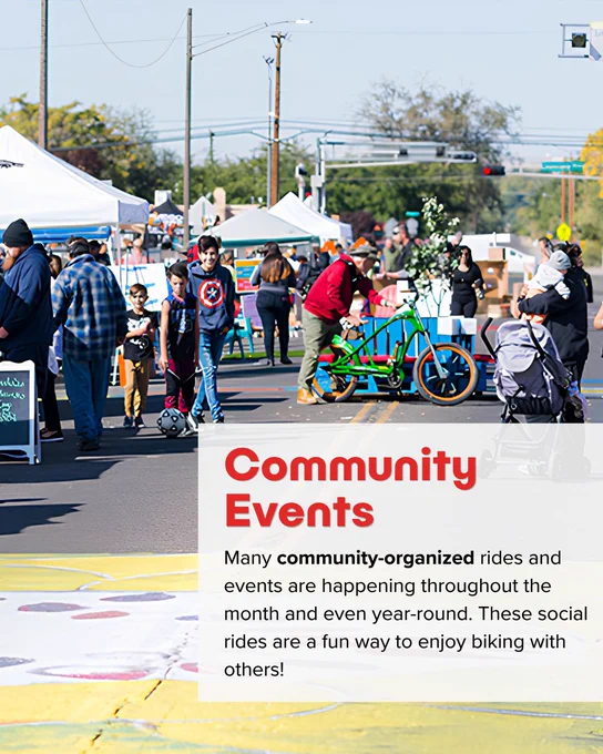 Families and individuals enjoy a sunny street fair with tents, bikes, and social activities in a lively community event.
