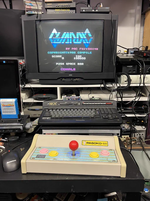 Panasonic aWX MSX 2  with a MSX arcade stick running Guardic from Compile