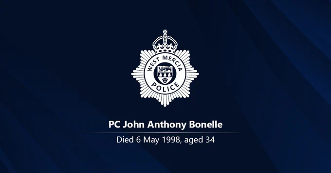 White West Mercia Police crest on a dark background with the name PC John Anthony Bonelle and the words: Died 6 May 1998, aged 34