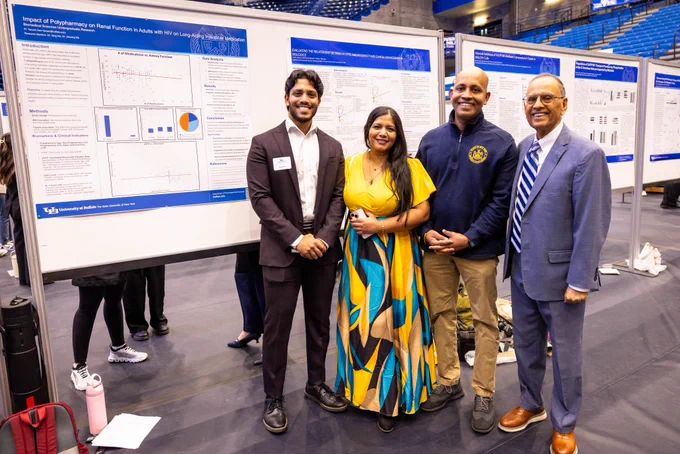 President Tripathi with a student scholar at the research showcase for the annual Celebration of Student Academic Excellence.