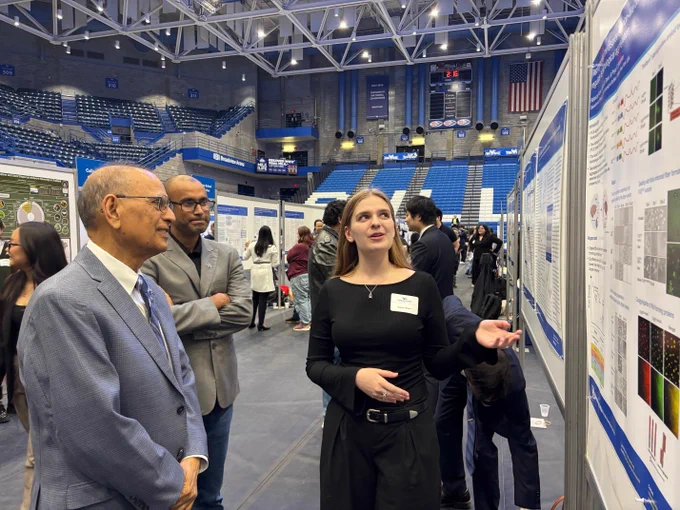 President Tripathi with a student scholar at the research showcase for the annual Celebration of Student Academic Excellence.