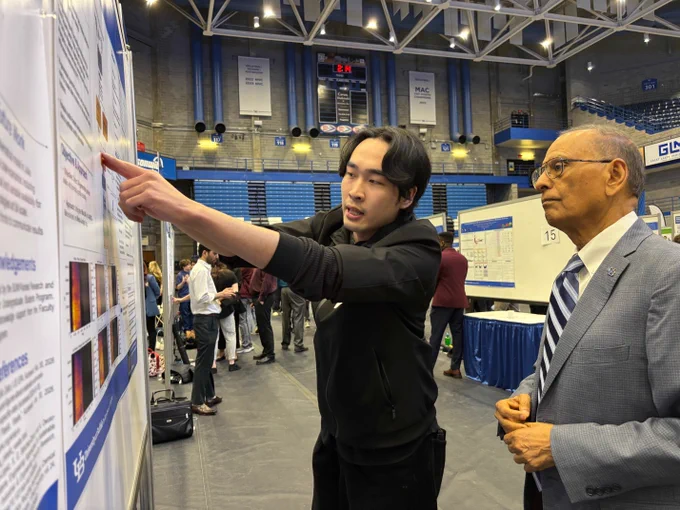 President Tripathi with a student scholar at the research showcase for the annual Celebration of Student Academic Excellence.