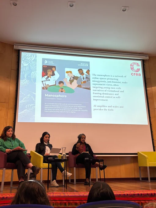 Panel discussion with three speakers seated on stage, wearing headsets, with a projected slide behind them, during a session titled “Misogyny and Algorithmic Discrimination: Meta’s Responsibilities in the Global South”; CREA’s Priya Das, Director – Programs and Innovation, is among the panelists.