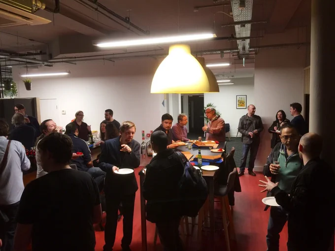 Macc Tech event networking, with pizza and drinks