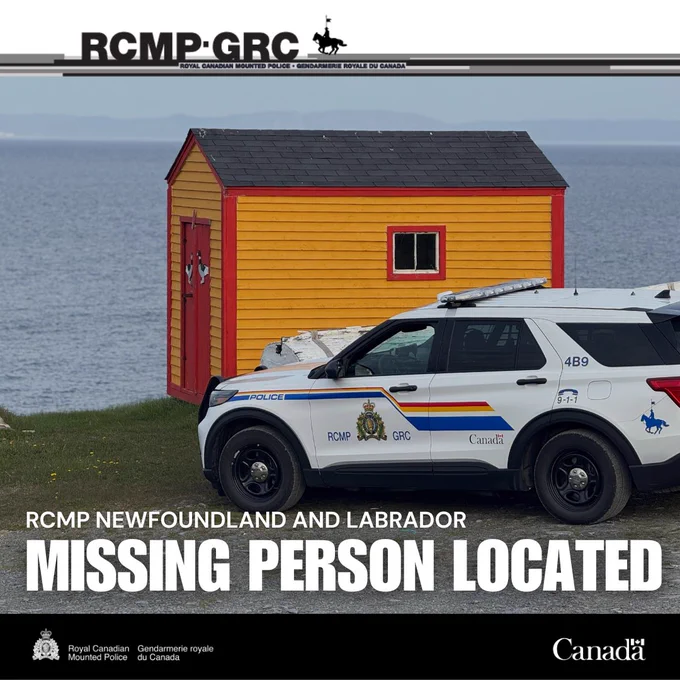 A photo of two RCMP vehicles parked next to a small yellow and red building, next to a large body of water. The words "MISSING PERSON LOCATED” and "RCMP NEWFOUNDLAND AND LABRADOR" are on the image.  