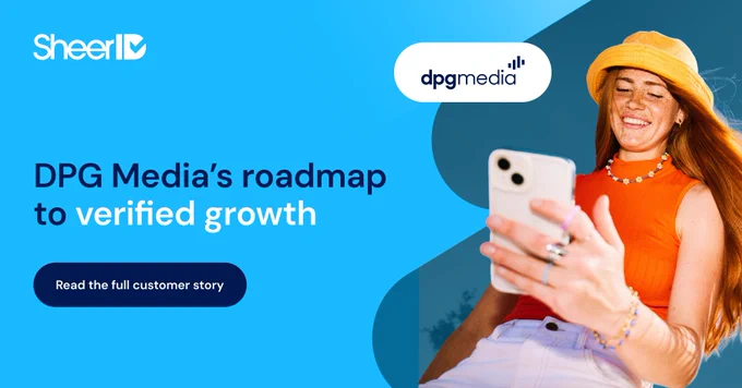 A person in a hat smiles while looking at a smartphone. The image includes logos for SheerID and DPG Media. Text reads, "DPG Media’s roadmap to verified growth," with a button stating, "Read the full customer story.