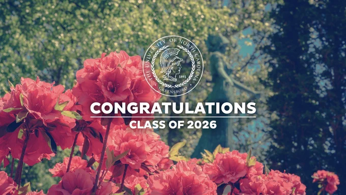 Bright pink flowers in bloom with a congratulatory message for the Class of 2026 overlaid on a sunny, leafy background.