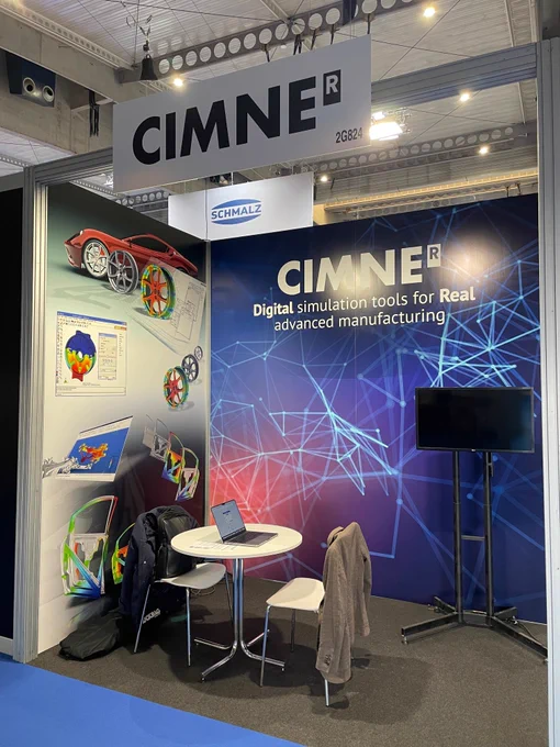 CIMNE booth at Advanced Factories 2026 in Barcelona, featuring a large banner with the slogan “Digital simulation tools for Real advanced manufacturing.” The display includes visual examples of computational simulations and industrial applications, with team members presenting CIMNE’s technological capabilities in digital twins, process optimization, and advanced manufacturing.