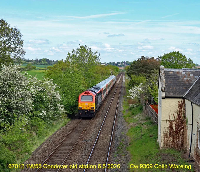 Transport for Wales locomotive 67012 pushes a train towards Shrewsbury passing the old station at Condover between Church Stretton and Shrewsbury. 
The train is the 08.53 service from Cardiff Central to Manchester Piccadilly, running under train reporting no 1W55. 
The line from Newport up to Shrewsbury and on to Crewe is known as the Welsh Marches line after the towns and countryside it passes through.
The station at Condover was closed in 1958 with the station buildings still being here and the site is now a cattery and kennels, though the platforms are long gone. 
Condover 6.5.2026
Photo image Cw 9369 Copyright Colin Wareing 
Cw 9369 Colin Wareing aka Capt Col
