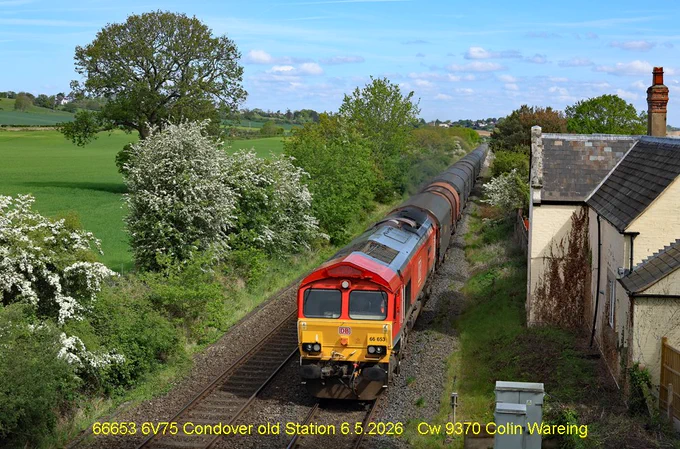 DB Cargo locomotive 66653 passing the old station at Condover between Church Stretton and Shrewsbury with a train of empty steel wagons. 
The train is the 09.31 service from Dee Marsh near Shotton in North Wales to Margam steel works in South Wales running under train reporting no 6V55. 
The station at Condover was closed in 1958 with the station buildings still being here and the site is now a cattery and kennels, though the platforms are long gone. 
Condover 6.5.2026
Photo image Cw 9370 Copyright Colin Wareing 
Cw 9370 Colin Wareing aka Capt Col
