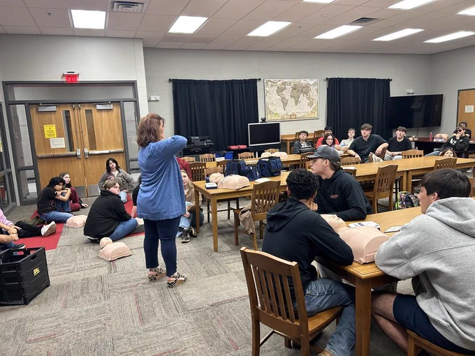 CKTC employees Brent Lester and Laci McCool recently provided CPR training for Hinton High School seniors.