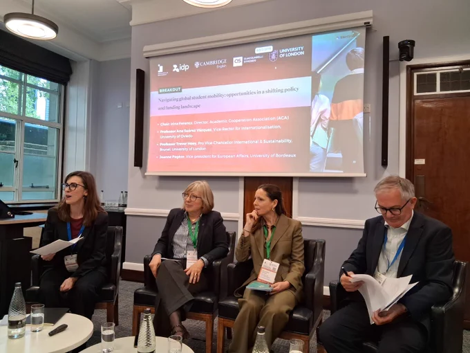 Four people in a panel discussion.