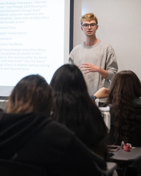 Student gives a presentation in class.