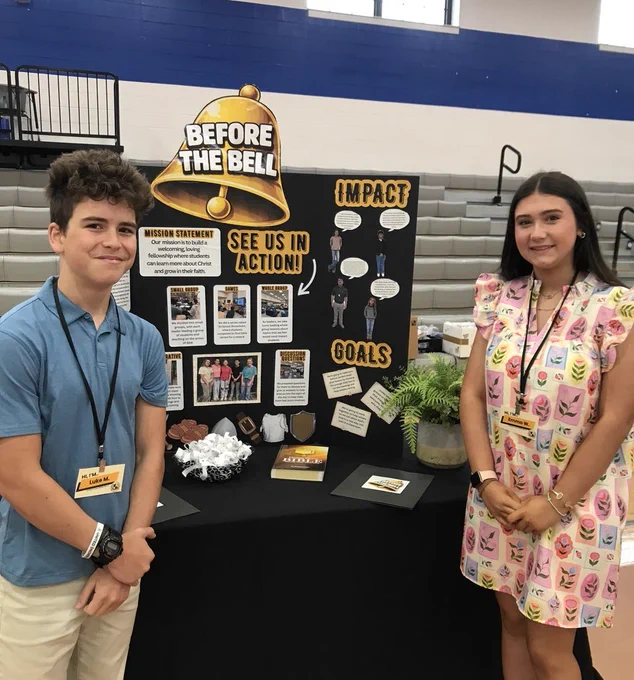 Students sharing their project with visitors