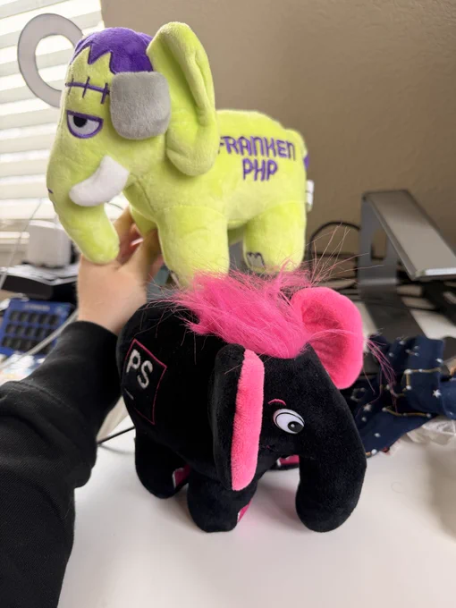 A PHPstorm jetbrains elePHPant with a FrankenPHP elePHPant behind it