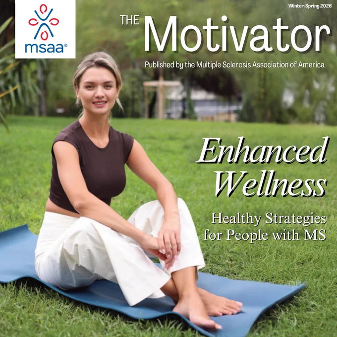 A person sits cross-legged on a blue exercise mat outdoors, surrounded by greenery. The magazine cover is titled "The Motivator," published by the Multiple Sclerosis Association of America. The issue is for Winter/Spring 2026 and features the headline "Enhanced Wellness: Healthy Strategies for People with MS.