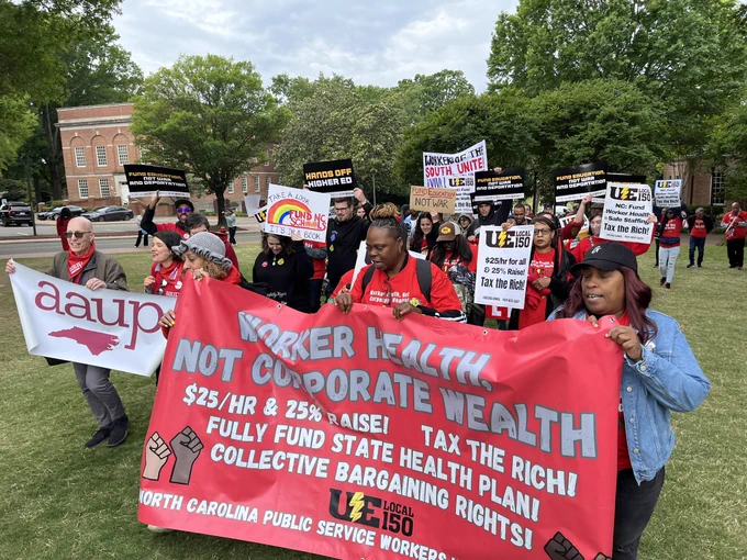 Local 150 members march in North Carolina.