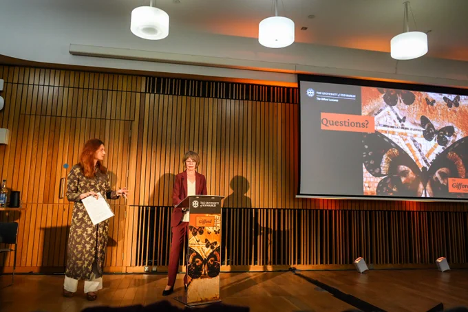 Inside the Edinburgh Informatics Forum, Prof. Wild-Wood (left) and Prof. Fredriksen (right).