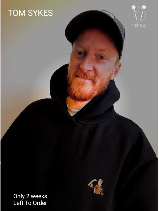 Photo of Tom Sykes wearing his 9 dart threads darts hoodie by 9 dart threads 