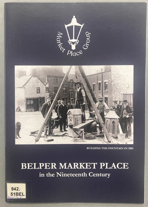 Front cover of the publication 'Belper Market Place in the Nineteenth Century' by Market Place Group. It features a black and white photograph showing a group of men building a small structure. The caption reads 'Building the fountain in 1881'.