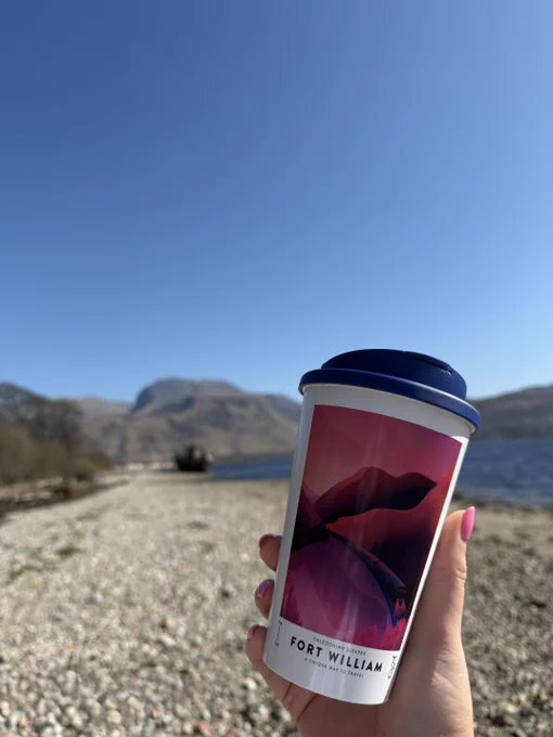 Fort William travel cup with a view of the Corpach shipwreck and Ben Nevis in the background.