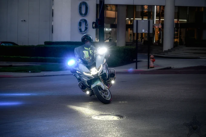 downtown columbus at night with a motorcycle