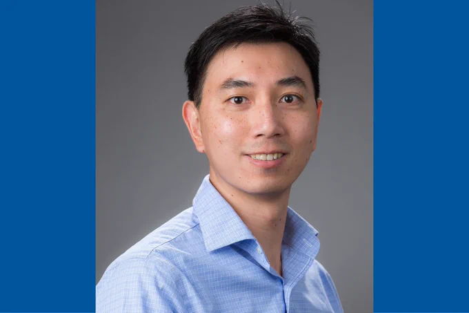 Headshot of Chang-Lung Lee, PhD, on blue background