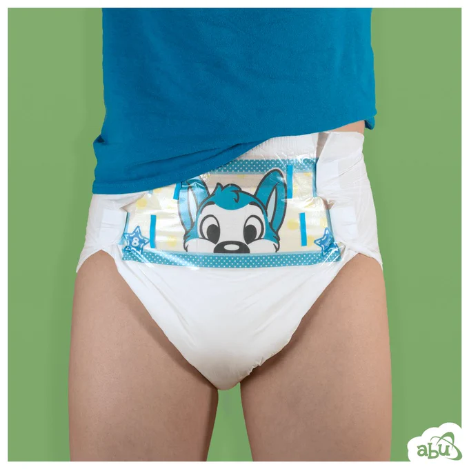 Product photo of ABUnivere's Oops-All-Huskies! adult diaper. A white diaper featuring a landing zone design of a blue husky character. The Husky appears to be "peeking".